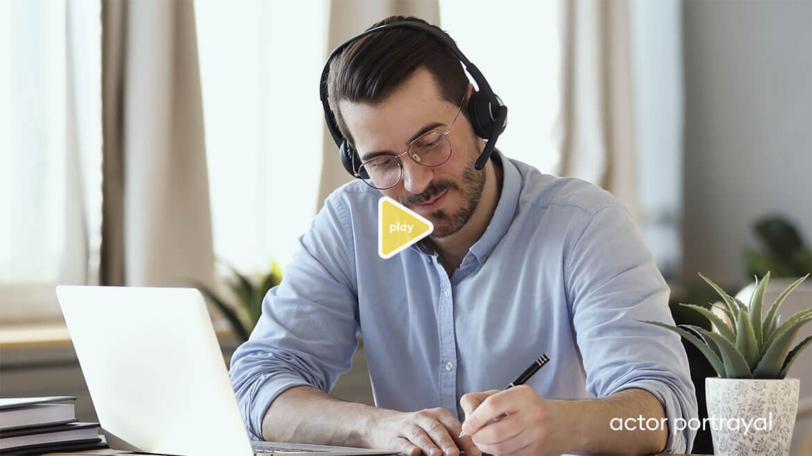 Actor portrayal of man at work wearing headset & on laptop reflects dedicated Acadia Connect™ patient Care Coordinator