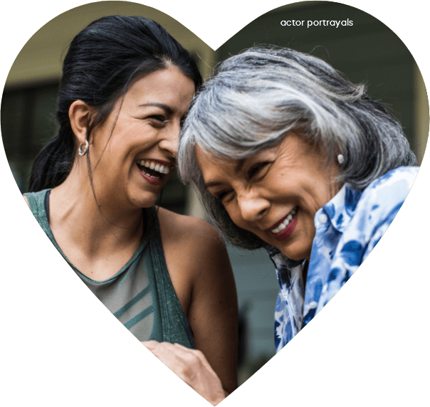 2 women laughing in heart shape reflects gratitude from enrolled caregiver for Acadia Connect™ Care Coordinator support