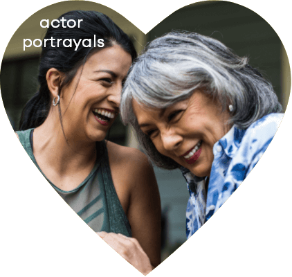 2 women laughing in heart shape reflects gratitude from enrolled caregiver for Acadia Connect™ Care Coordinator support